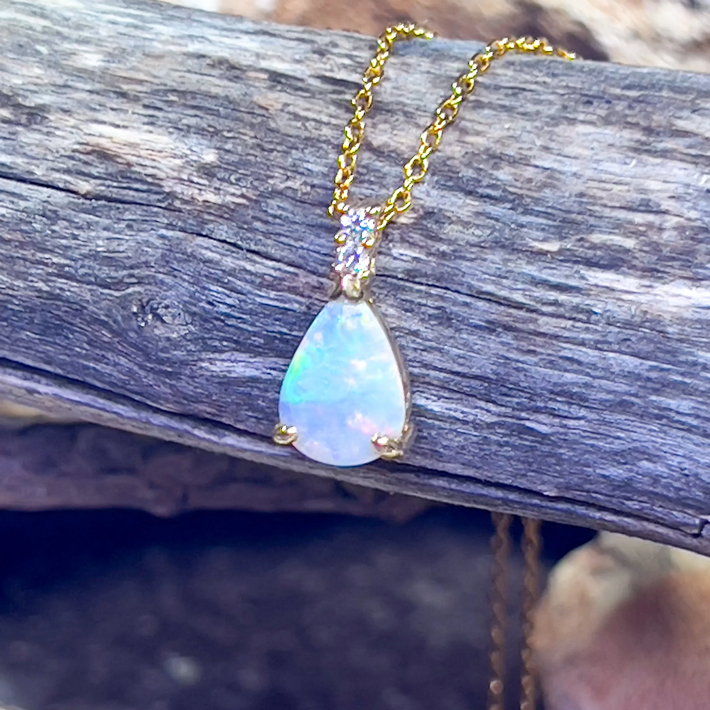 14kt Yellow Gold Pear shape 10x7mm Crystal Opal pendant