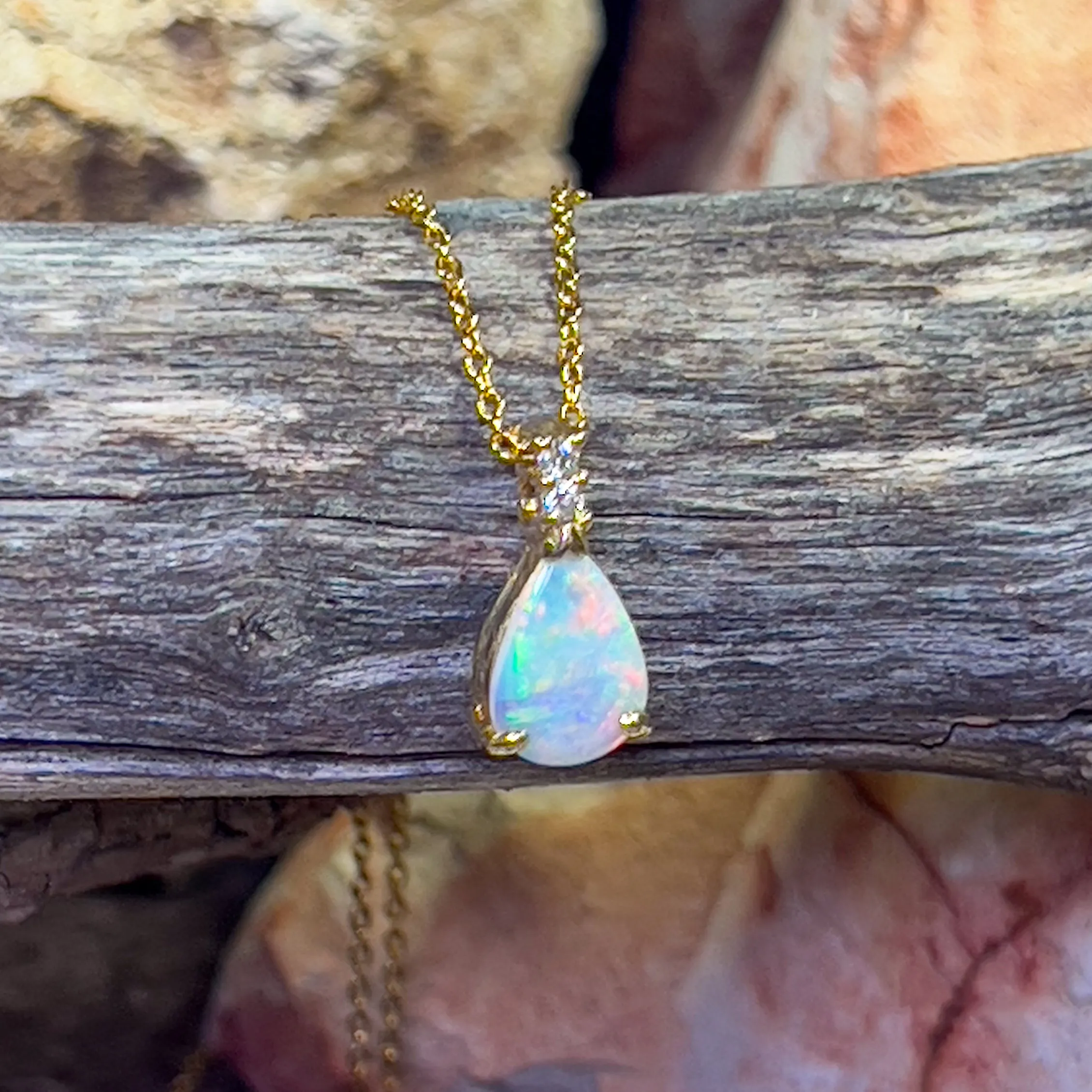 14kt Yellow Gold Pear shape 10x7mm Crystal Opal pendant