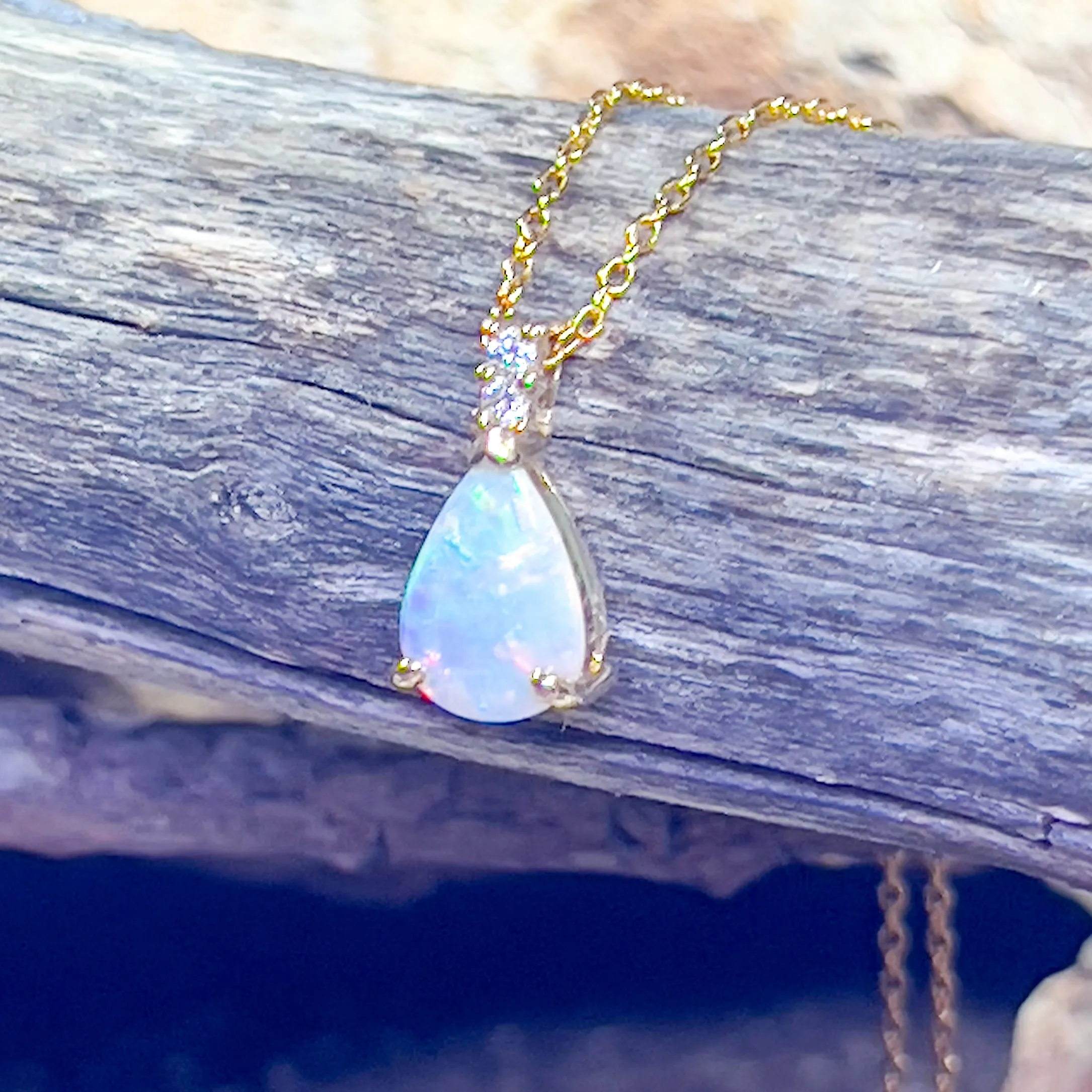 14kt Yellow Gold Pear shape 10x7mm Crystal Opal pendant