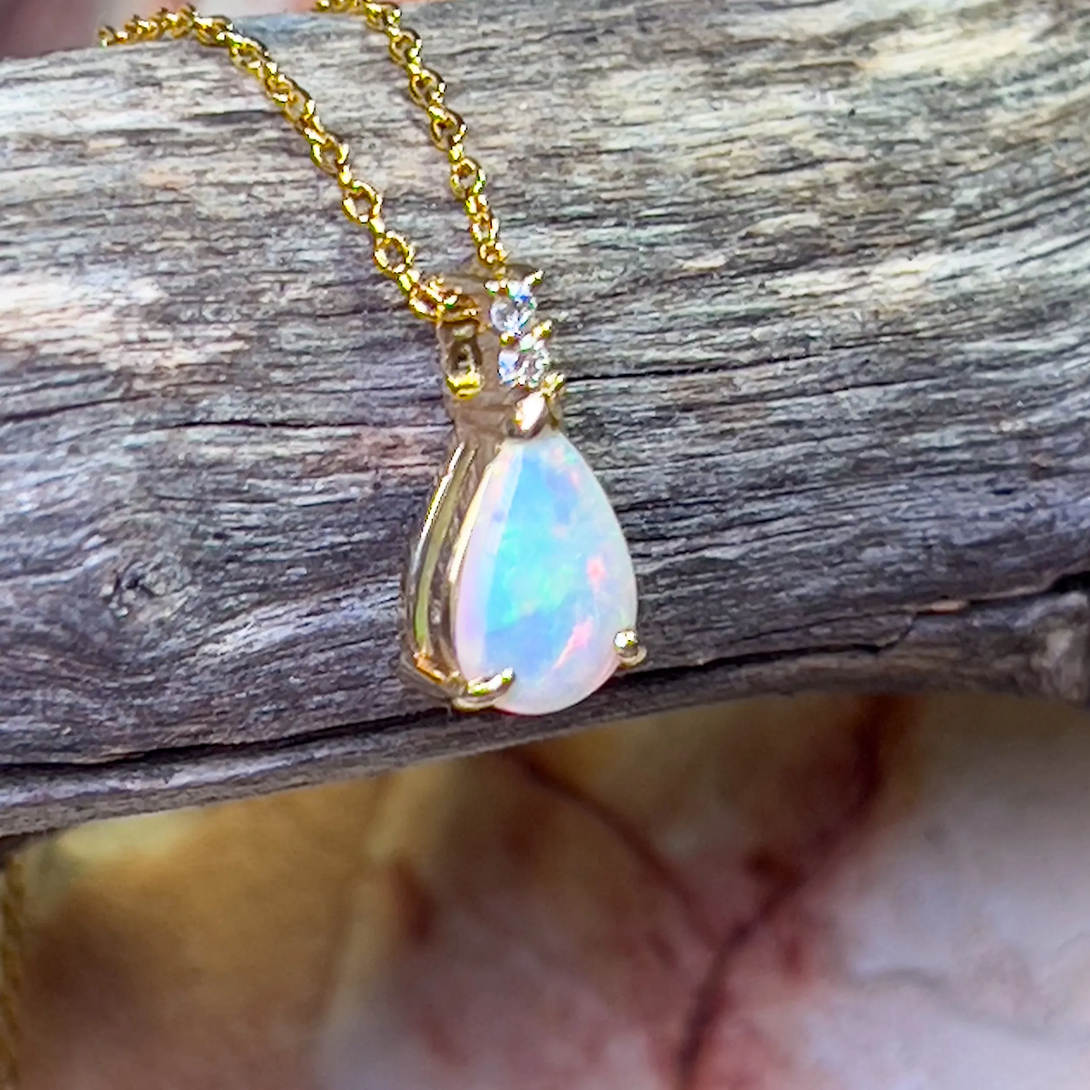 14kt Yellow Gold Pear shape 10x7mm Crystal Opal pendant