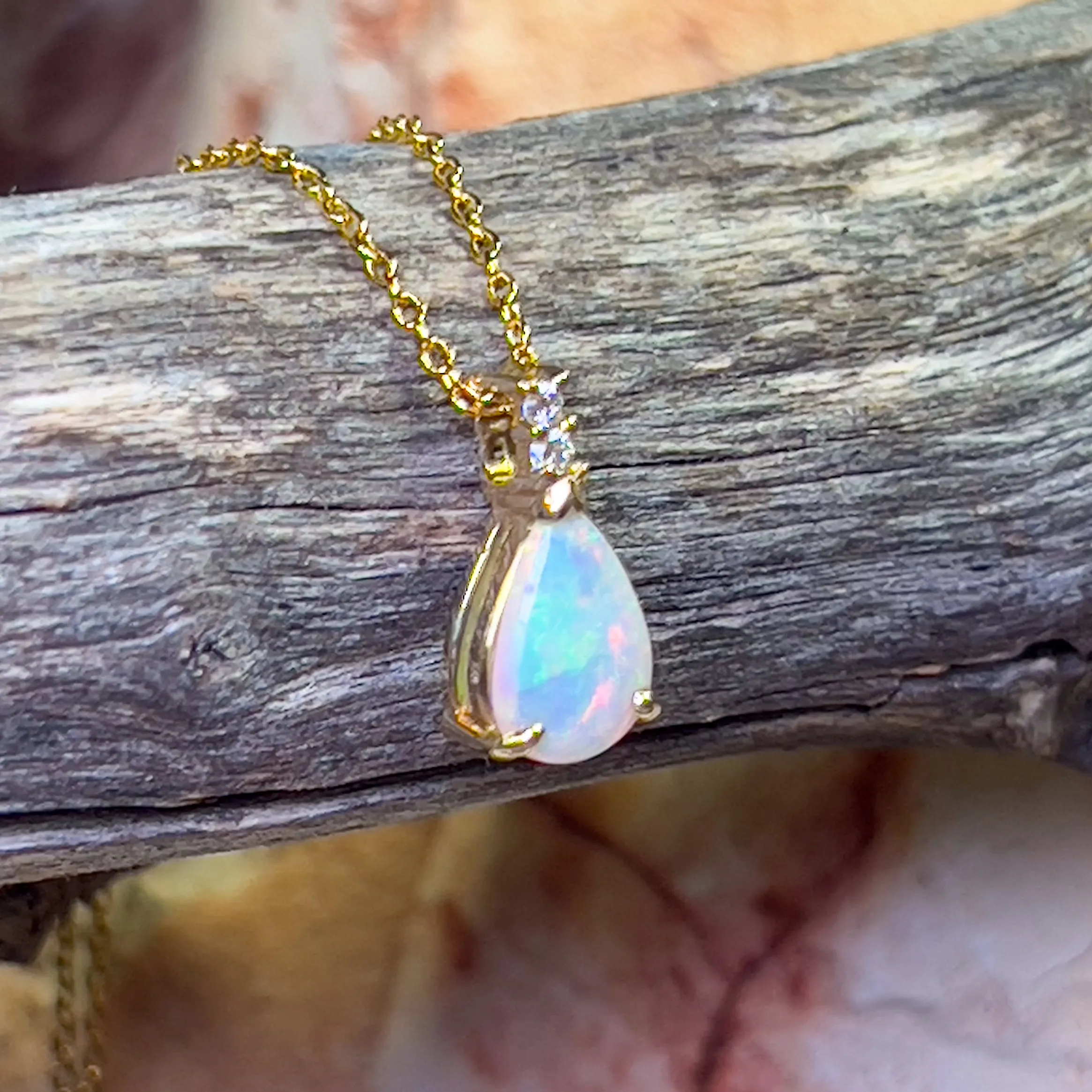 14kt Yellow Gold Pear shape 10x7mm Crystal Opal pendant