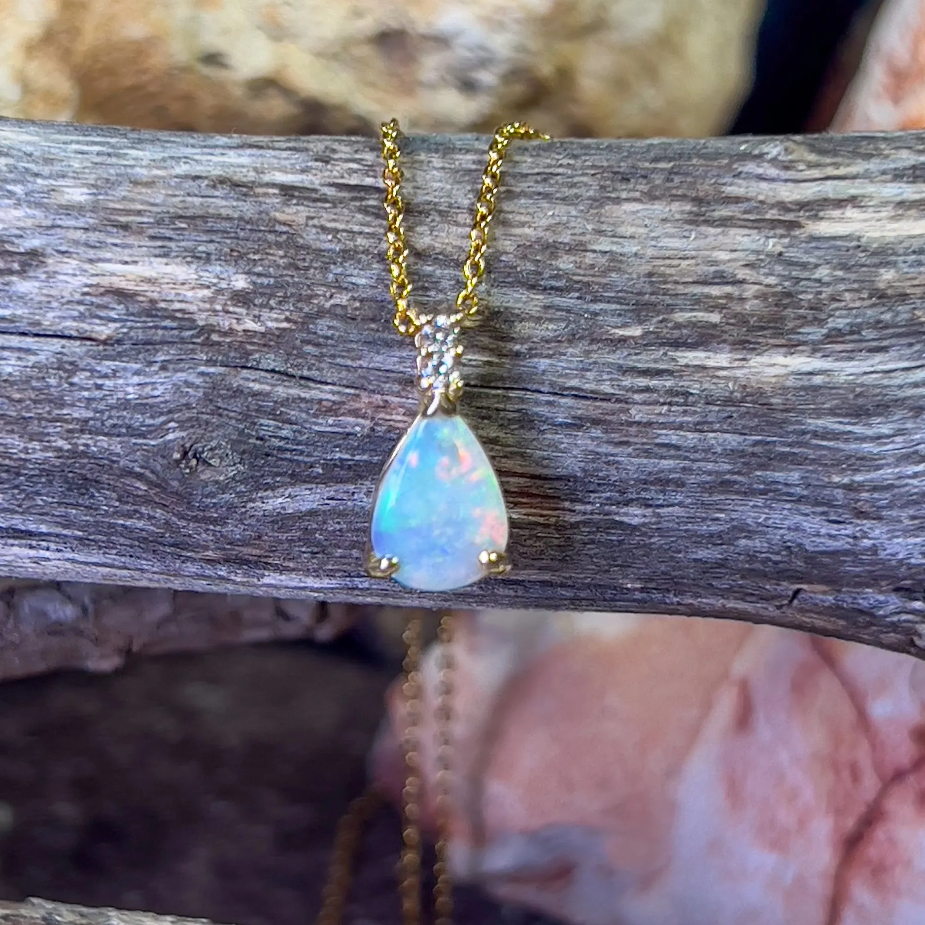 14kt Yellow Gold Pear shape 10x7mm Crystal Opal pendant