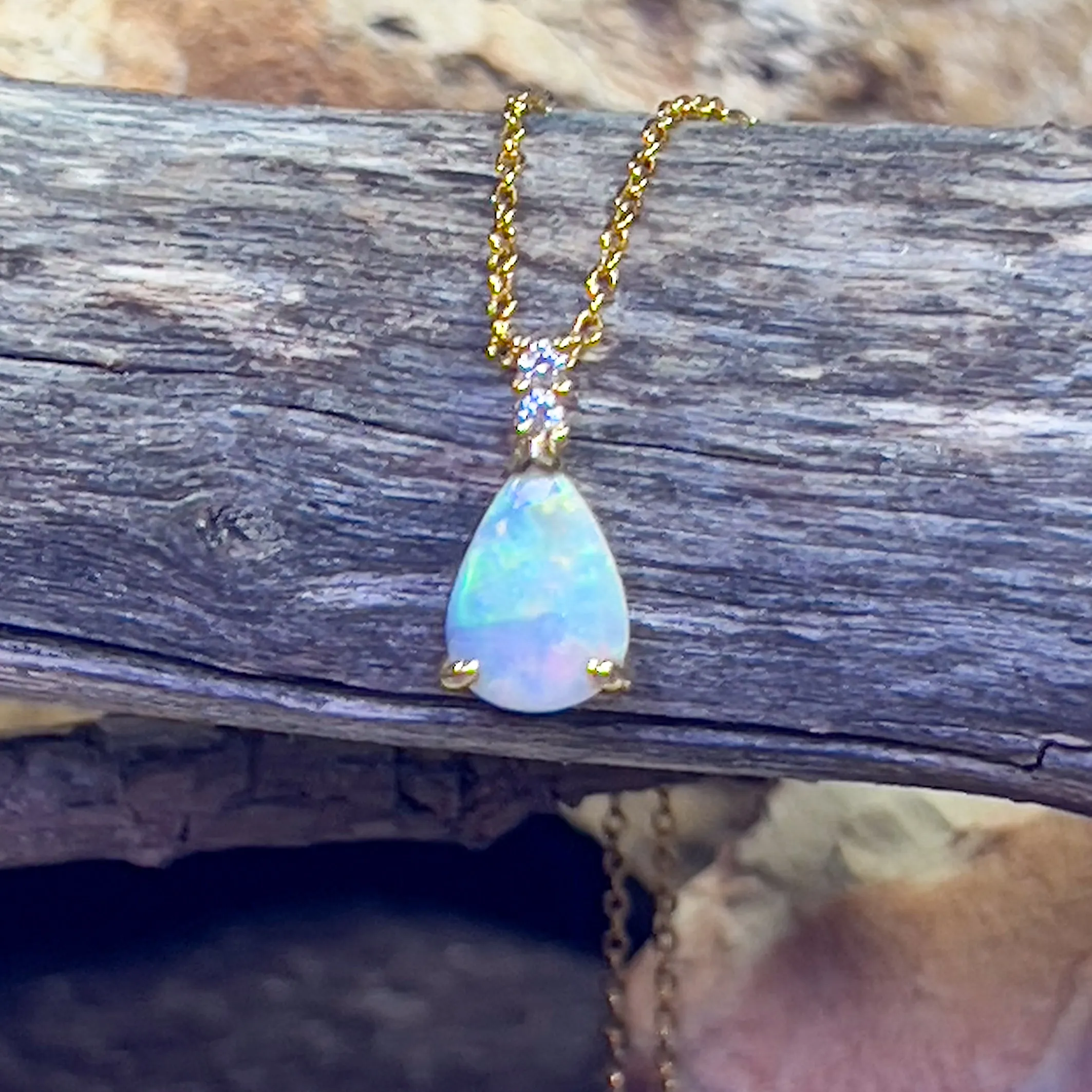 14kt Yellow Gold Pear shape 10x7mm Crystal Opal pendant