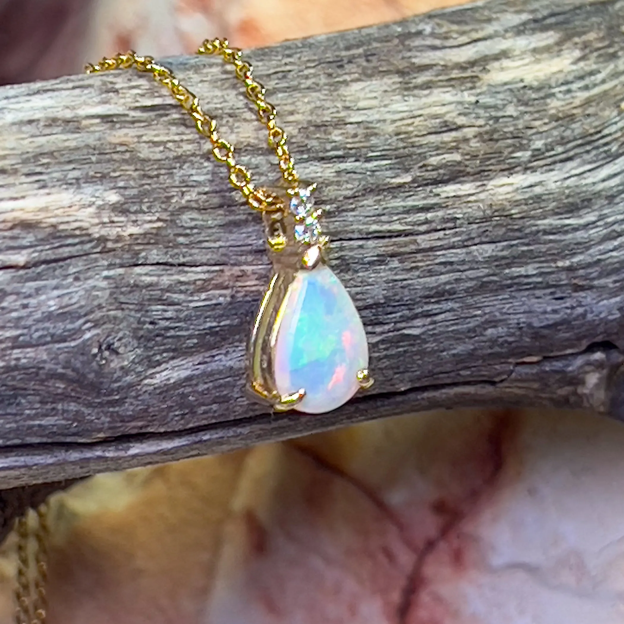 14kt Yellow Gold Pear shape 10x7mm Crystal Opal pendant