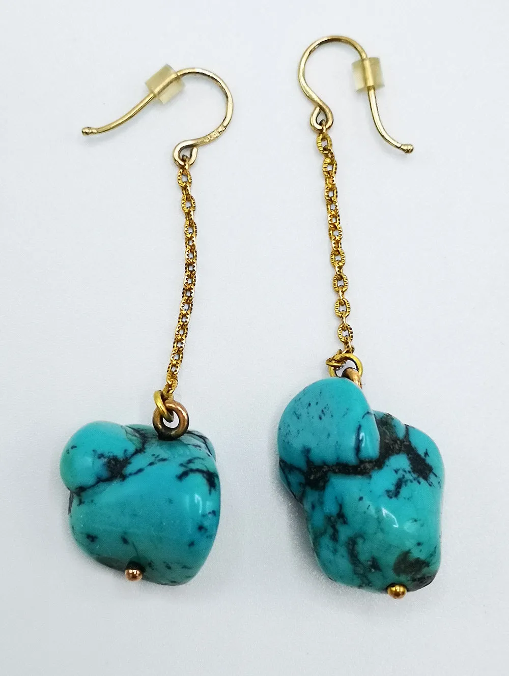 Huge turquoise and gold earrings. Gorgeous quality.