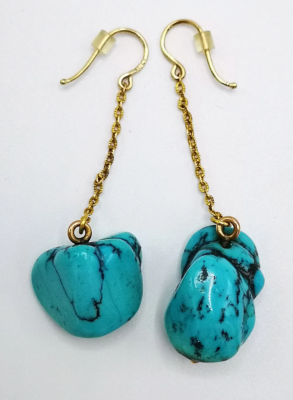 Huge turquoise and gold earrings. Gorgeous quality.