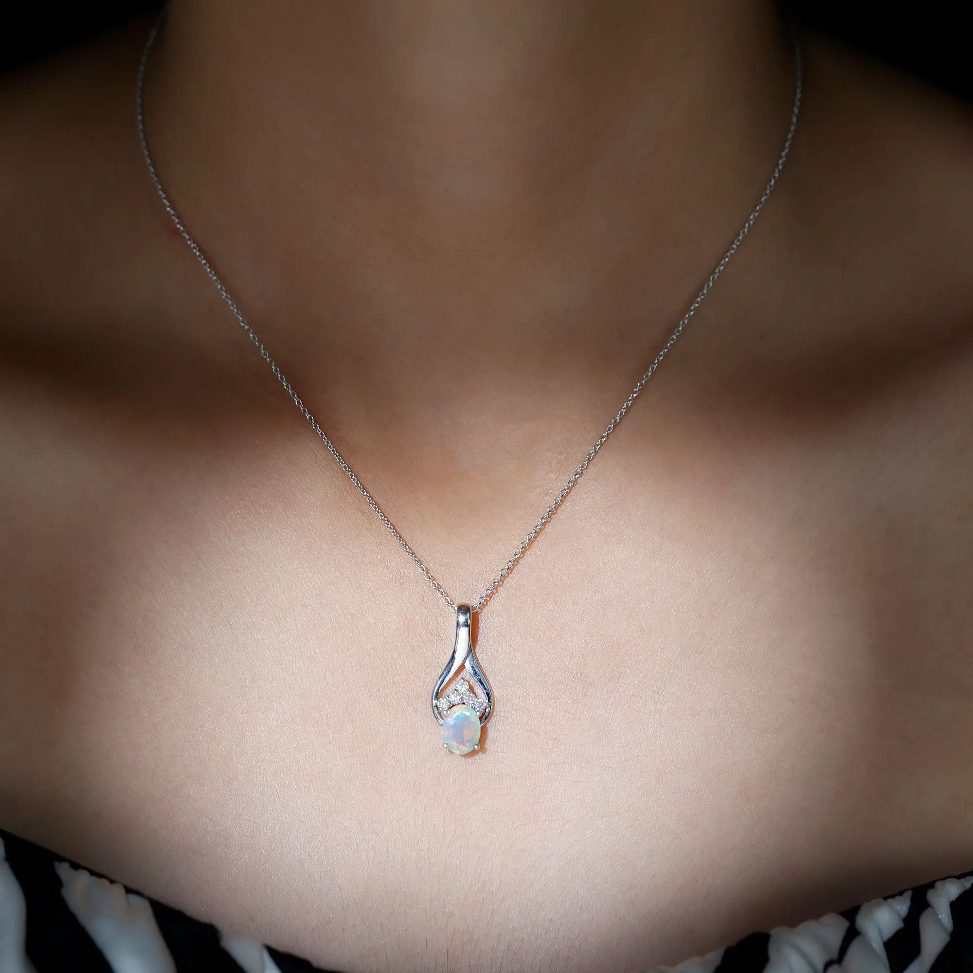 Oval Ethiopian Opal and Moissanite Silver Teardrop Pendant