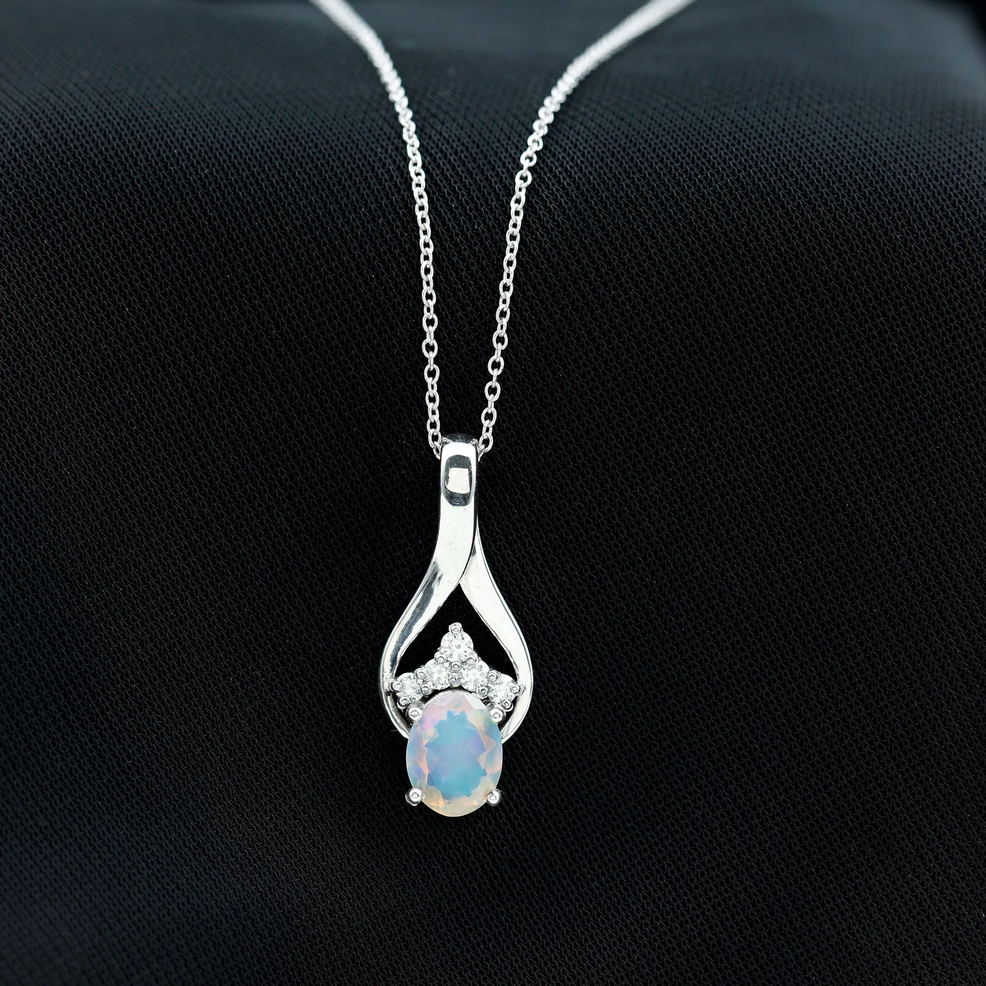 Oval Ethiopian Opal and Moissanite Silver Teardrop Pendant
