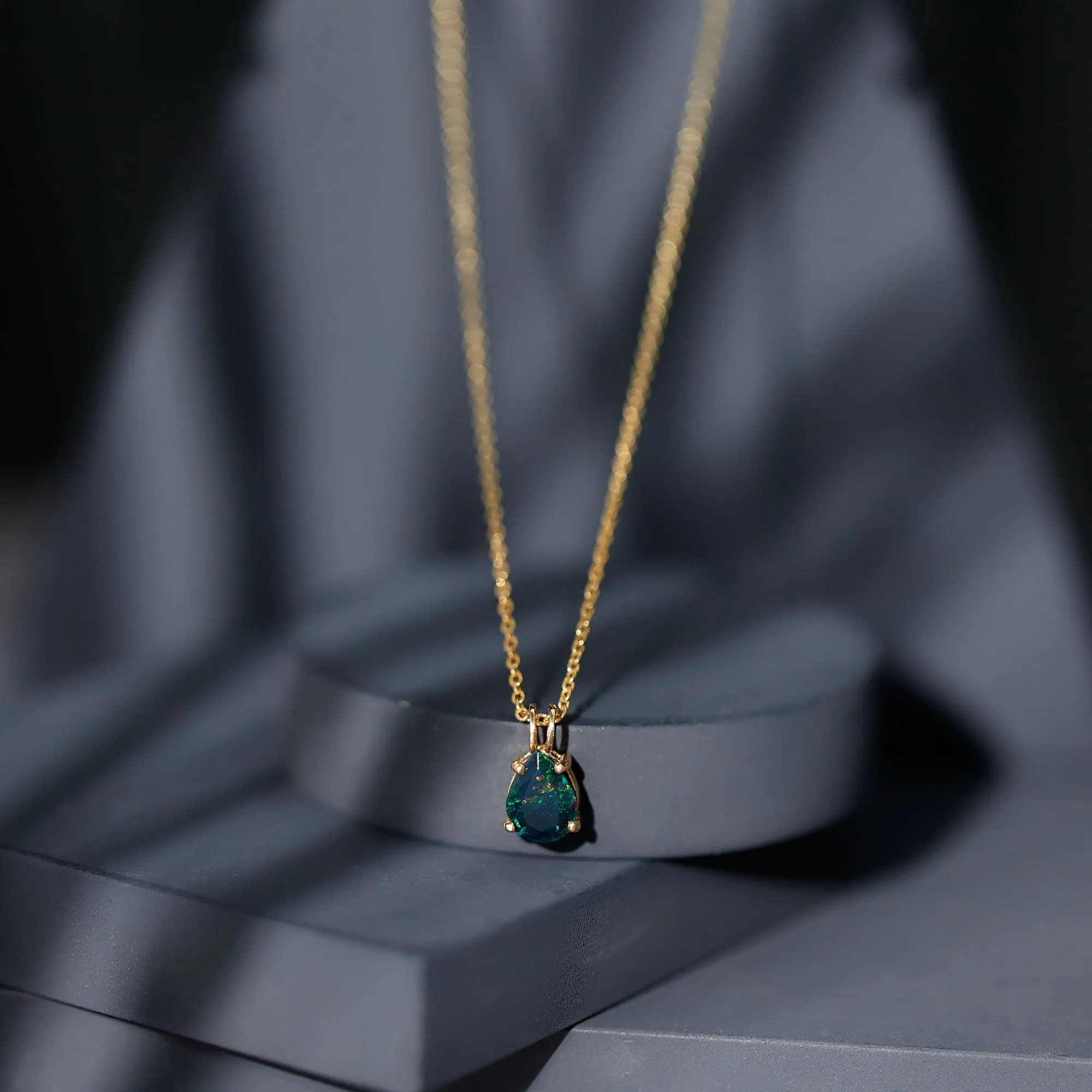 Pear Cut Natural Black Opal Solitaire Pendant in Gold
