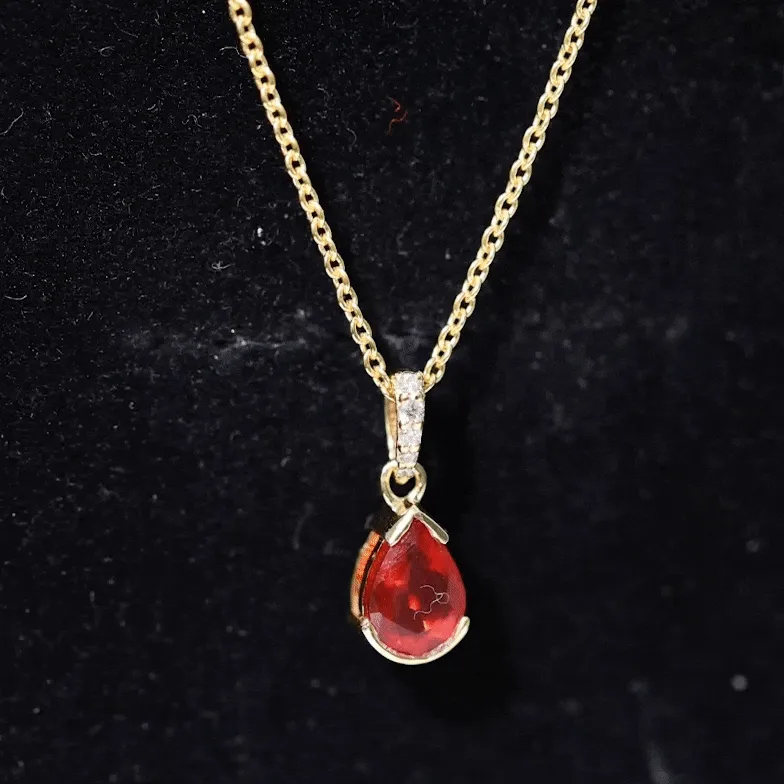 Pear Shape Fire Opal Solitaire Pendant with Diamond Accent Bail