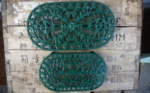Set of 2 ornate vintage green enamel trivet pot rests
